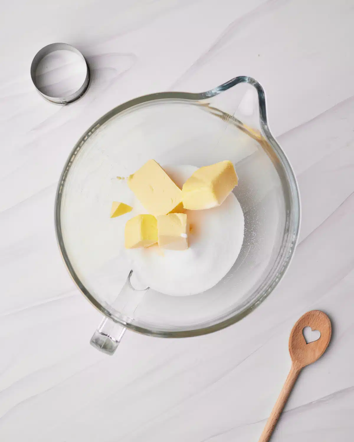 Butter and sugar in a large bowl to make jammie dodgers. 
