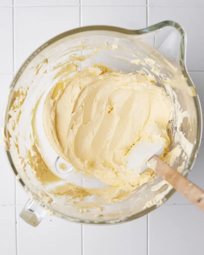French Buttercream in a glass bowl - thick and glossy.