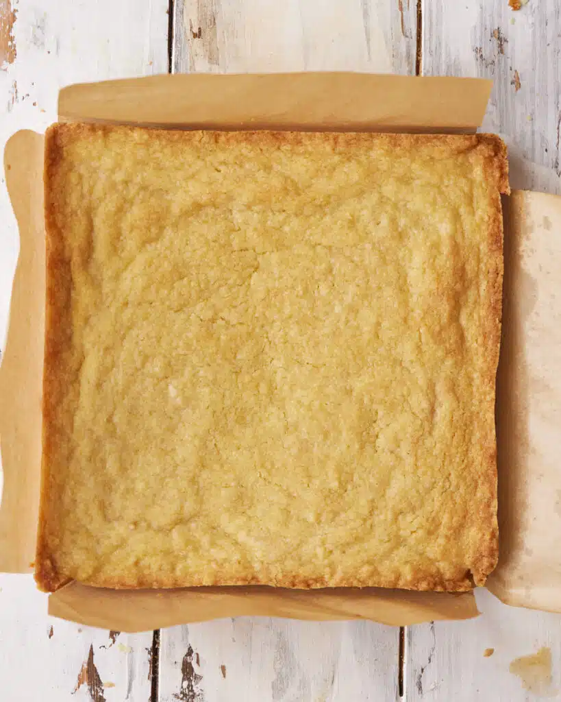 Scottish shortbread once baked and removed from the pan - it has golden brown edges.