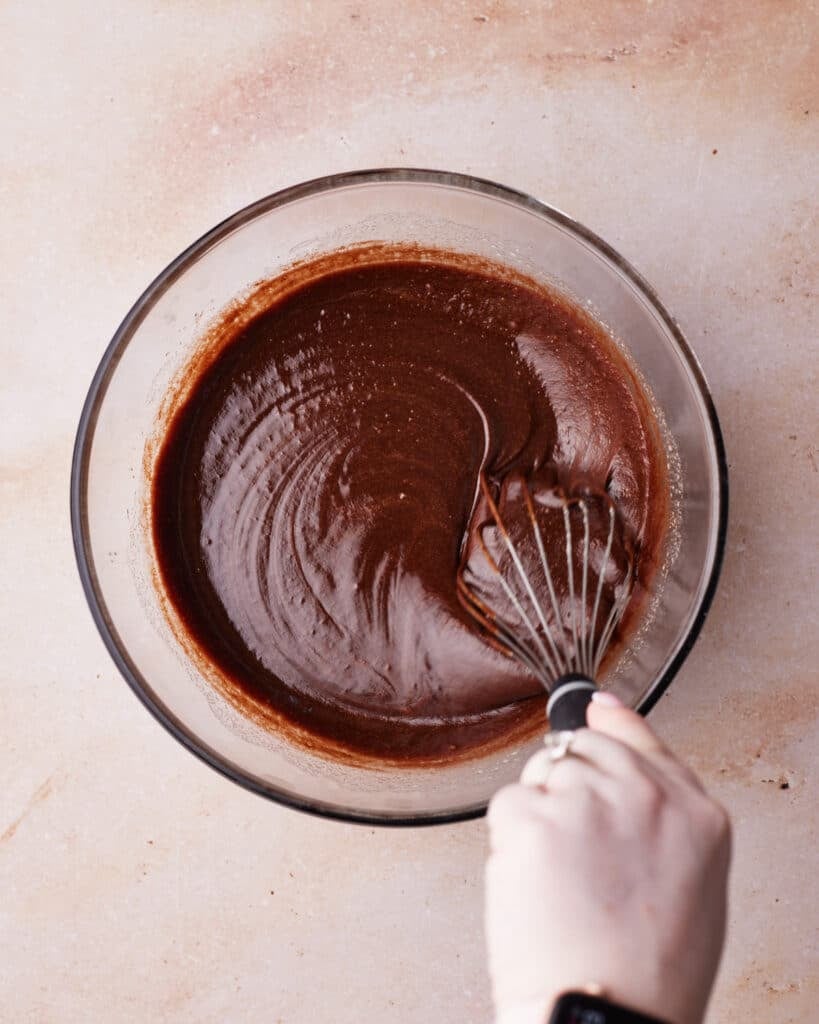 Process shot of making fudgy chocolate brownies for smores brownies.