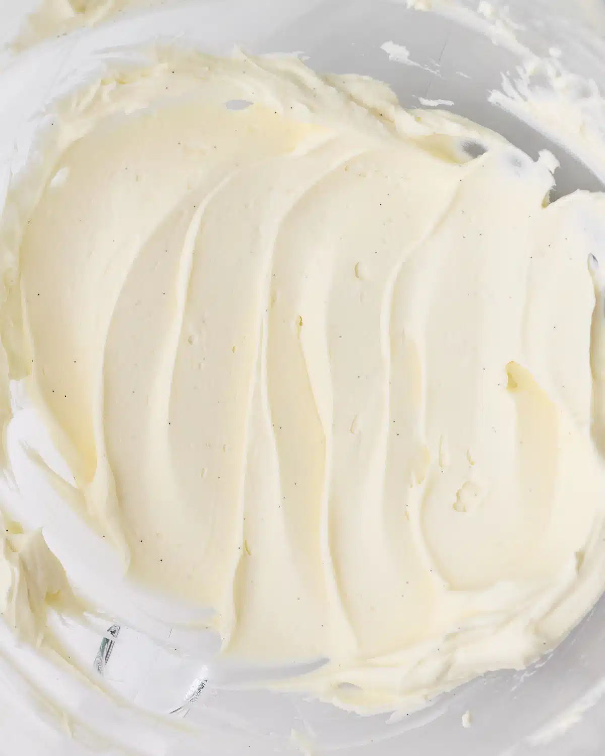 Silky smooth chantilly cream in a bowl.