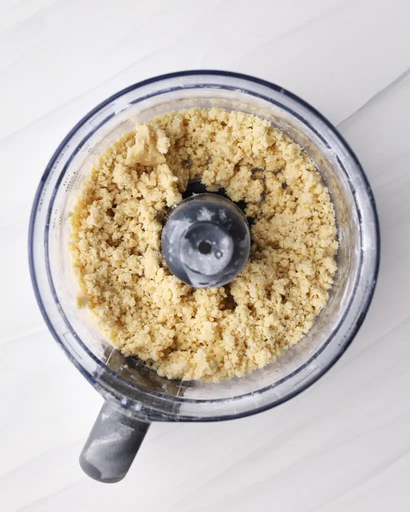 Process shot of making shortcrust pastry in the food processor.