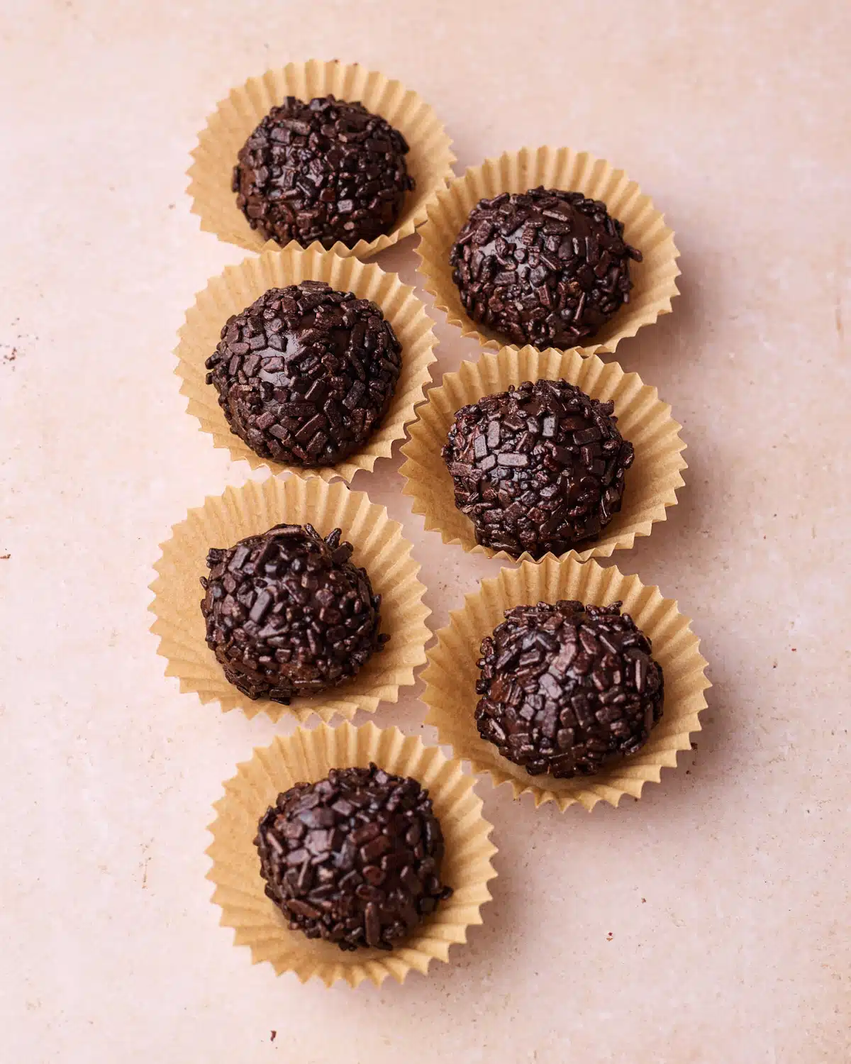 Chocolate brigadeiro all in a line.