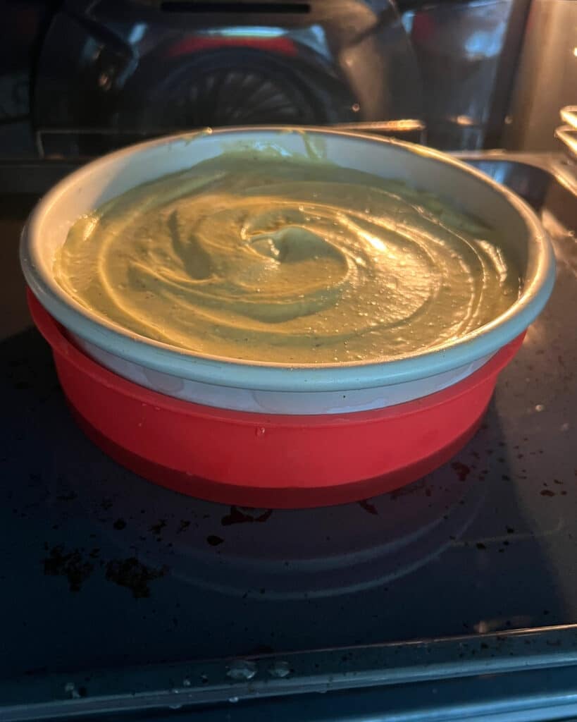 Baking pistachio cheesecake in a water bath. 