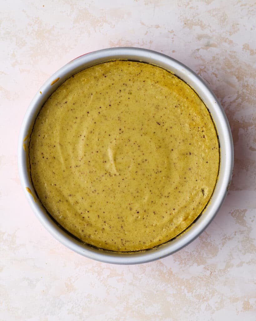 Baked pistachio cheesecake, cooling in the pan. 