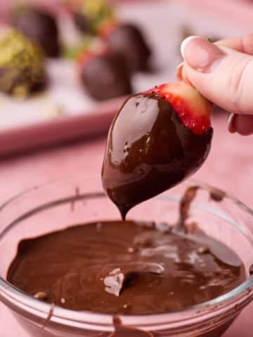 Making homemade chocolate covered strawberries.