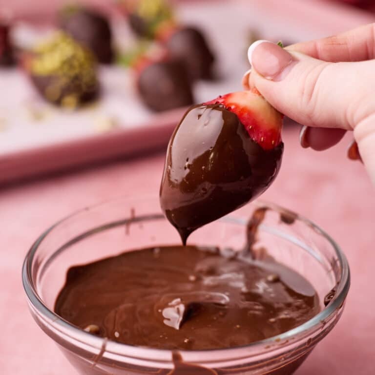 Making homemade chocolate covered strawberries.