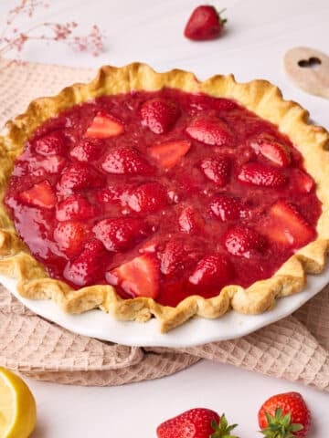 Finished strawberry pie pictured side on.