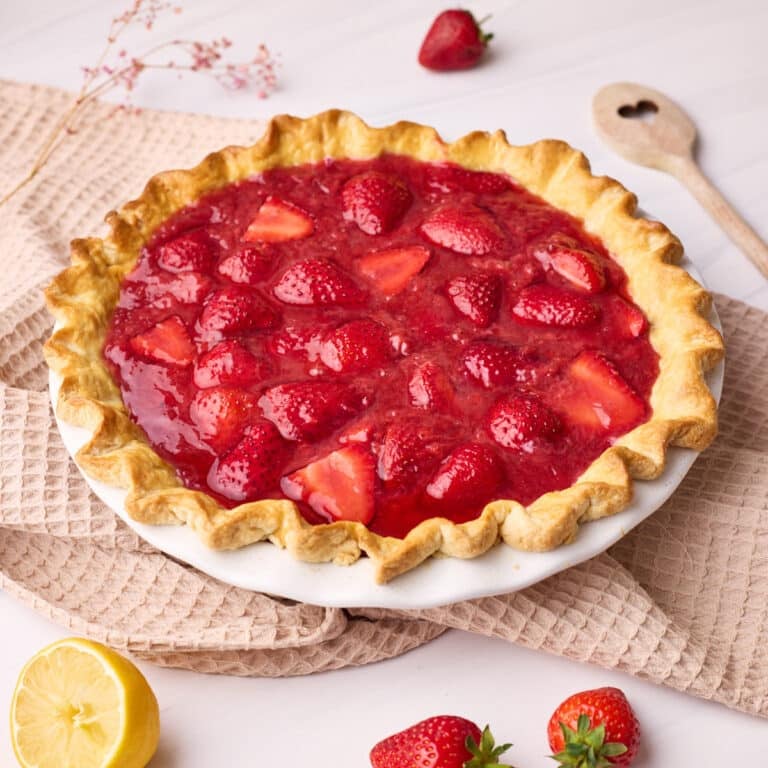 Finished strawberry pie pictured side on.