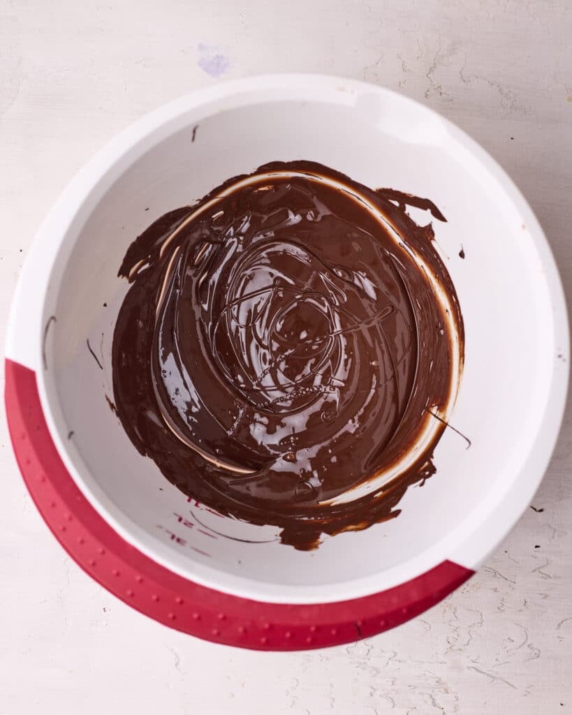Chocolate melted in a heatproof bowl.