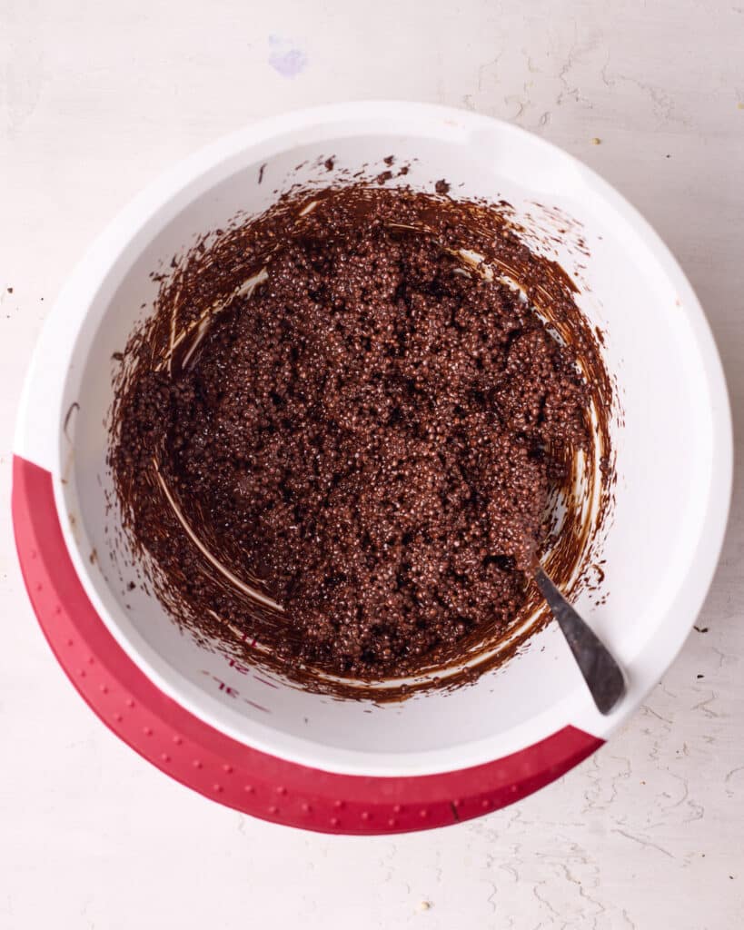 Quinoa added into the melted chocolate.
