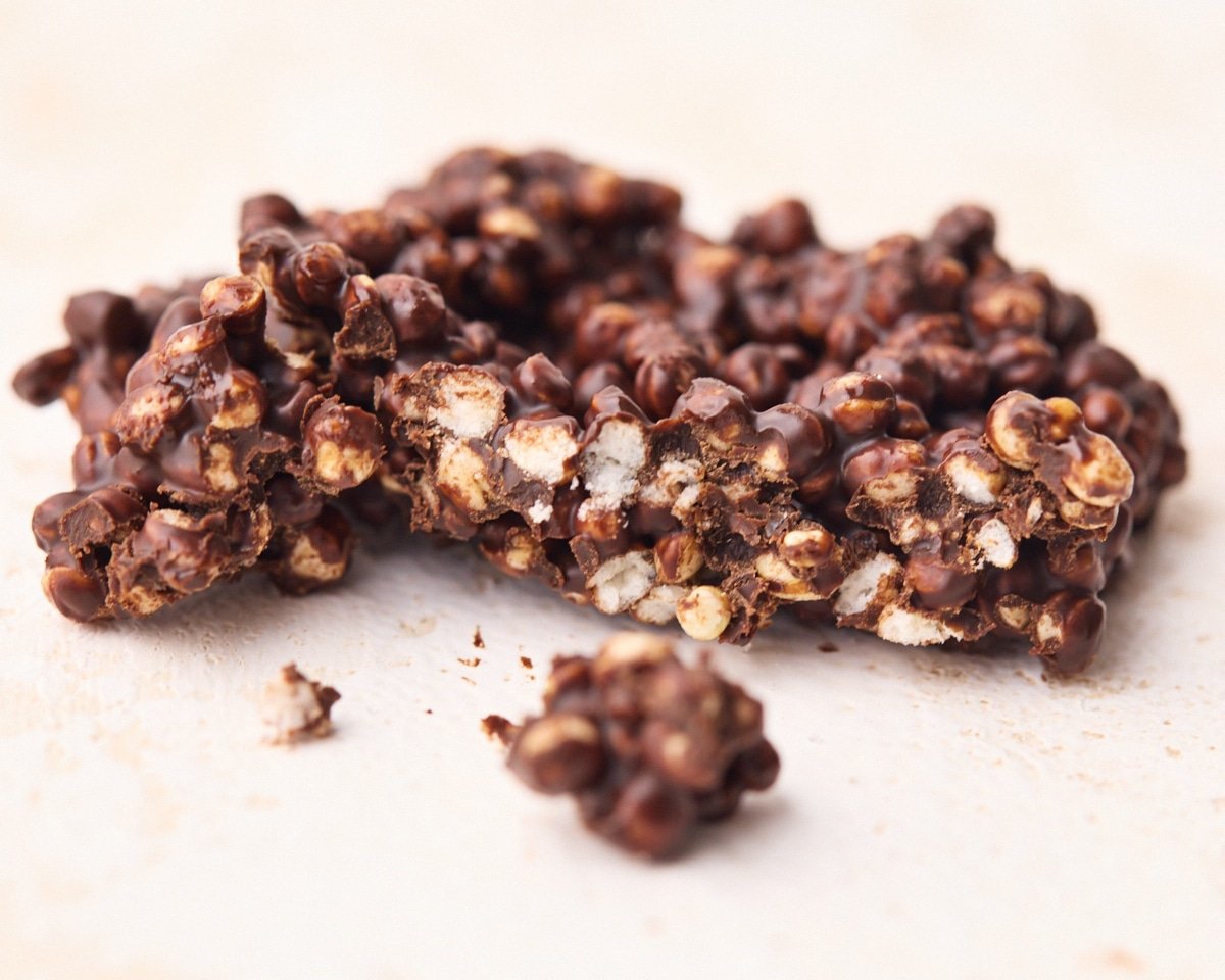 Close up of chocolate quinoa crisp after being bitten into.