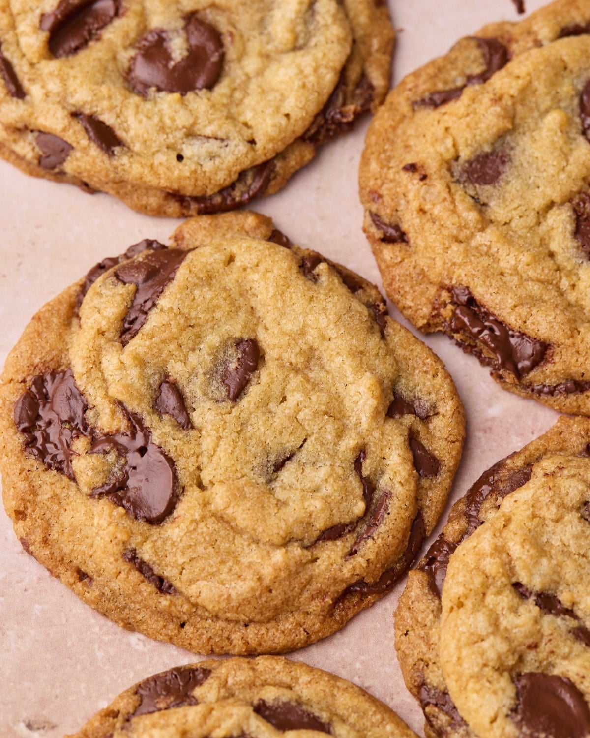 Overhead close up of some chocolate chip cookies.