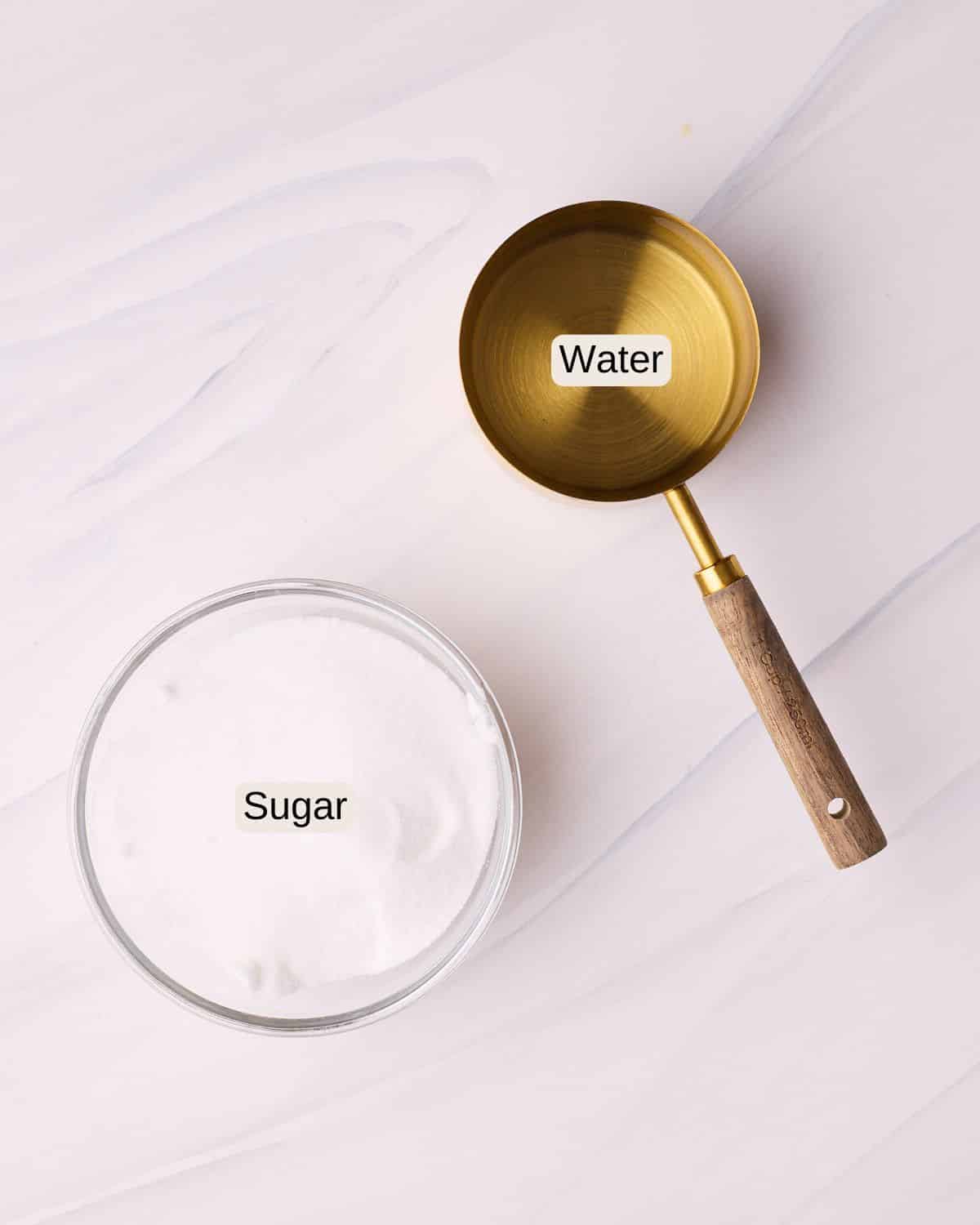 Labelled ingredients for simple syrup, including sugar and water.