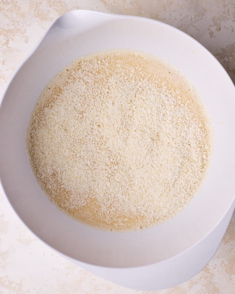 Coconut shreds added to the coconut custard mixture.