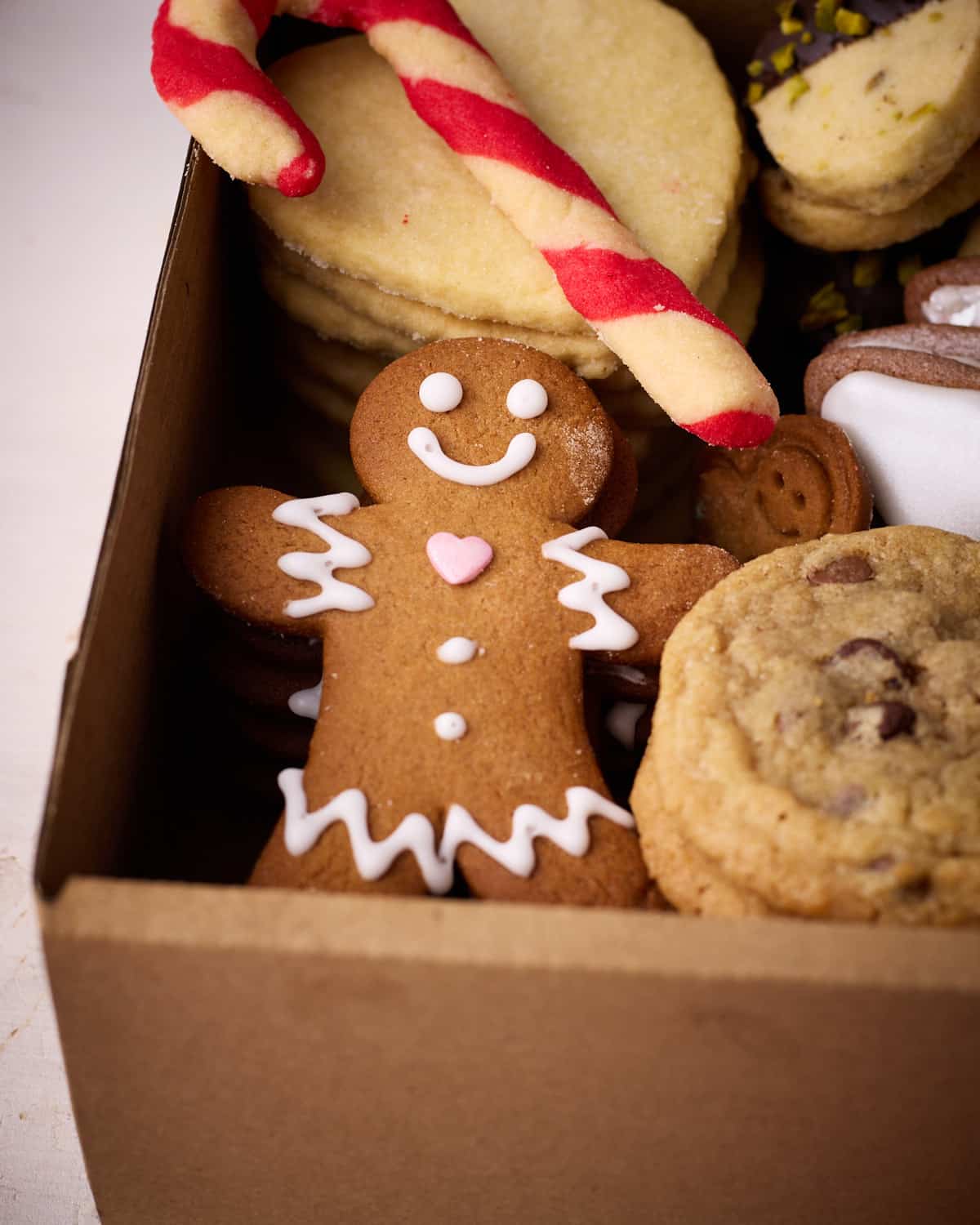 Gingerbread man in a christmas cookie box.