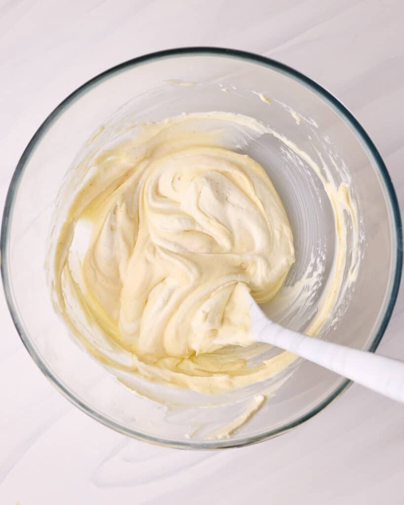 Chantilly cream being folded into pastry cream to make creme diplomat.