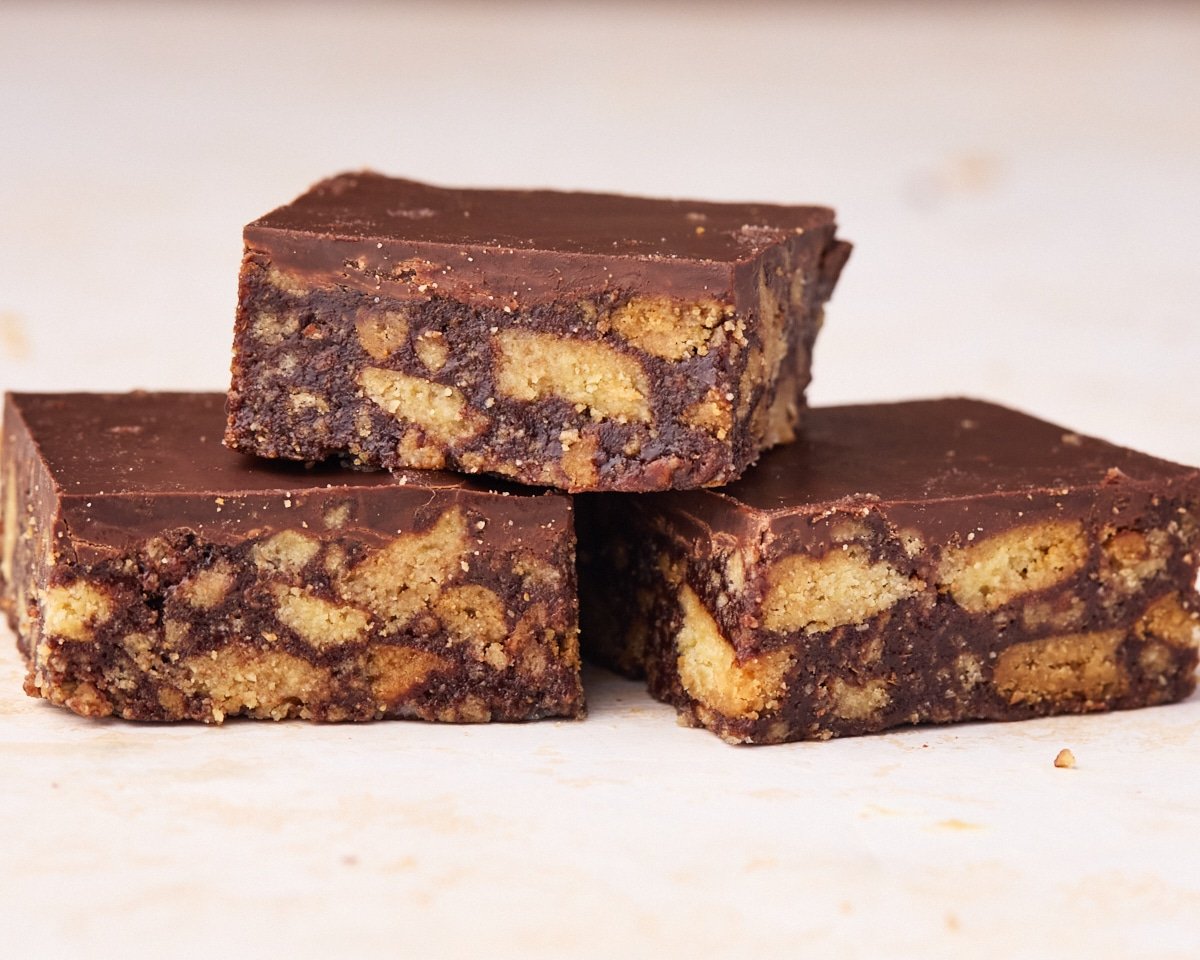 Three squares of the Scottish traybake, tiffin, sitting in a pile.
