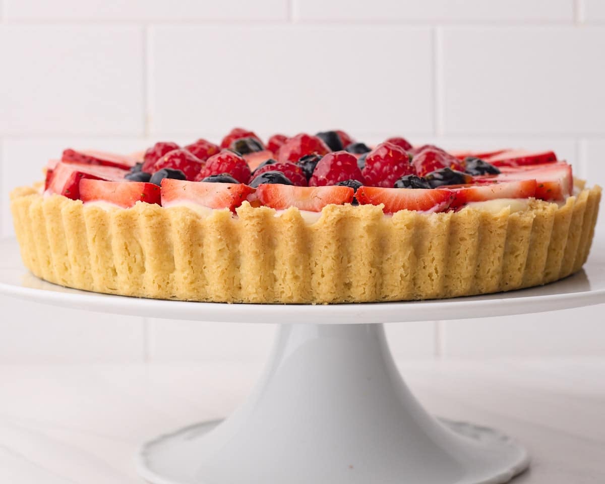 fruit tart from the side to show the shortbread crust (pate sablee). 