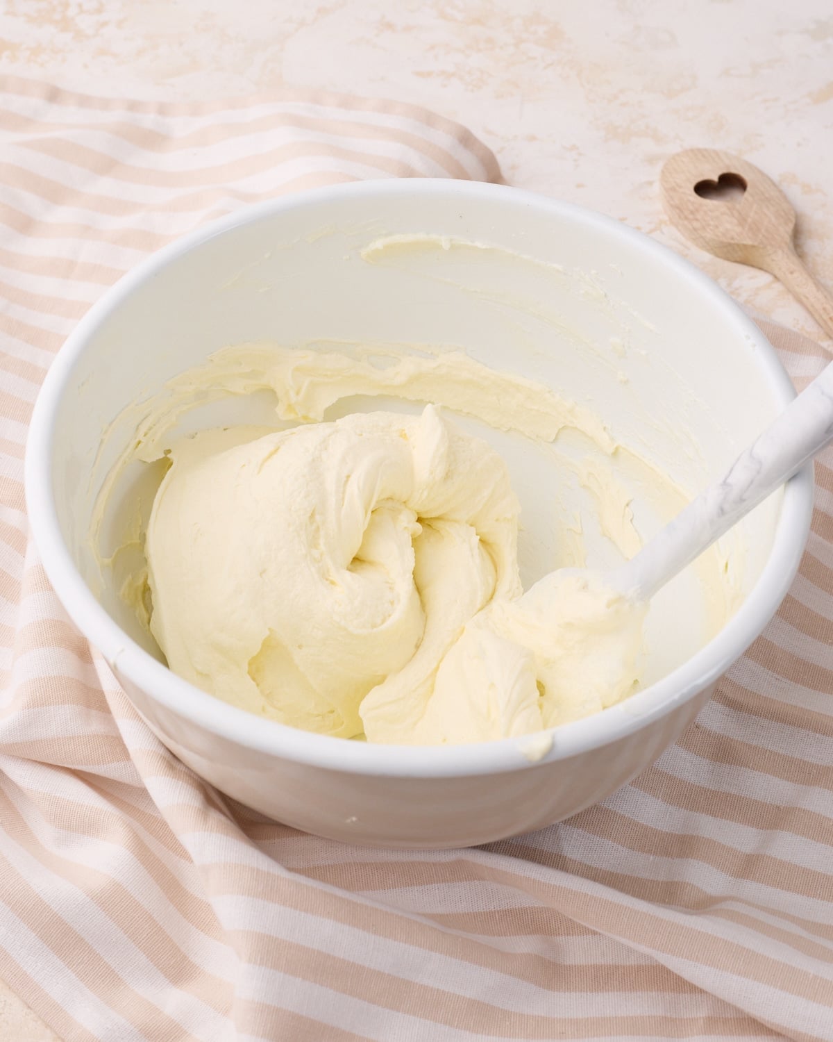 Mascarpone cream in a bowl having just been folded together.