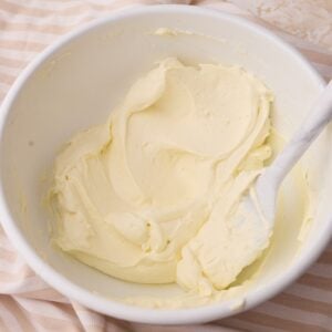 mascarpone cream in a bowl, showing the silky texture.