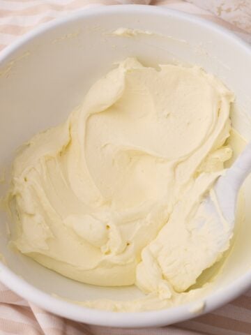 mascarpone cream in a bowl, showing the silky texture.